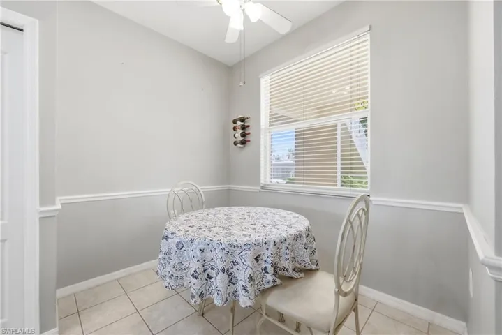 Tile flooring and baseboard trim throughout