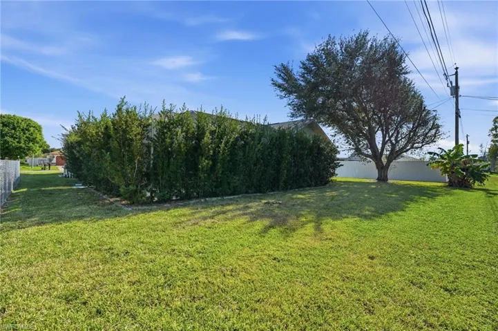 View of fenced backyard