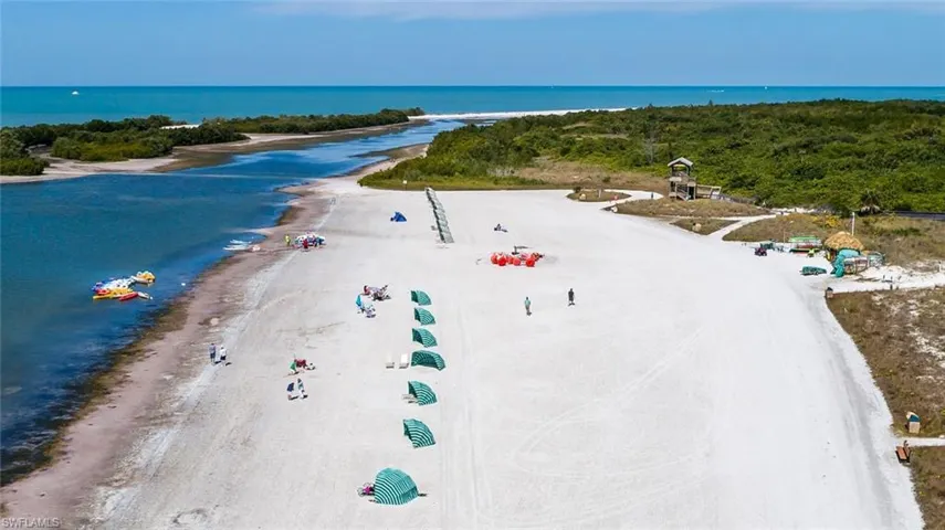 Aerial view with a view of the beach and a water view