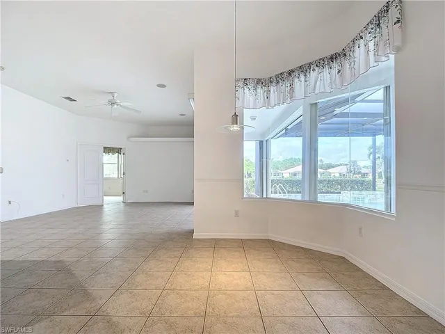 Breakfast Nook w/Bay Windows & Pool Views