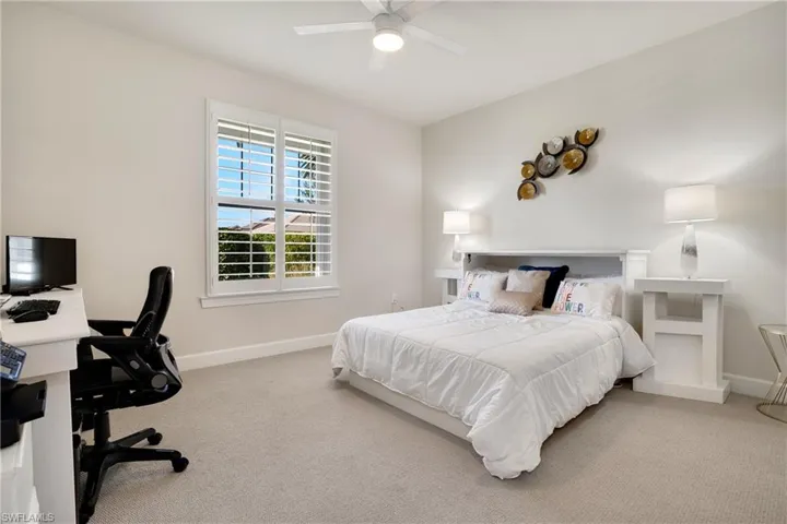 Bedroom with carpet floors and ceiling fan
