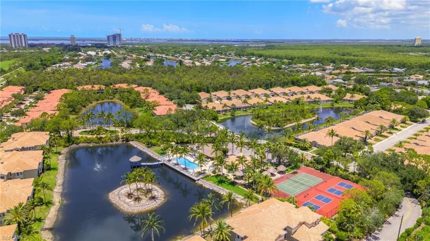 Aerial view of residential area with a large body of water