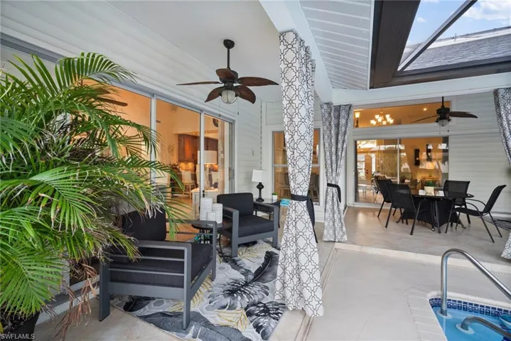 View of patio featuring ceiling fan