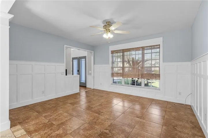 Spare room with ceiling fan