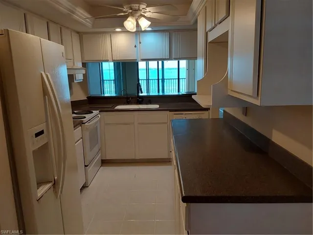 Kitchen with solid surface countertops, light and Bright and a killer view