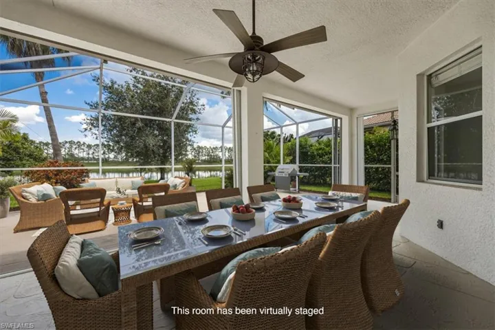 Virtually staged extended lanai with room for outdoor dining and conversation seating