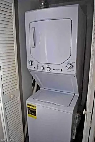 Laundry room with stacked washer / dryer