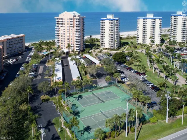 Aerial overview of property's location featuring a large body of water