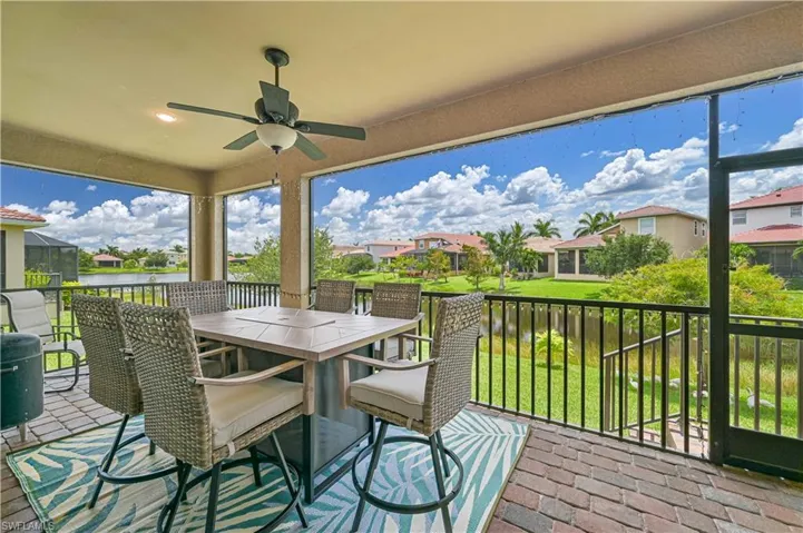 Deck with ceiling fan and a lawn
