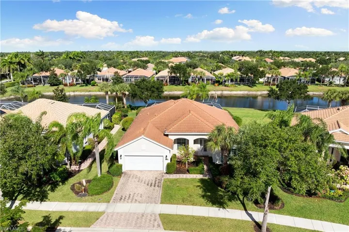 Aerial view of residential area with a nearby body of water