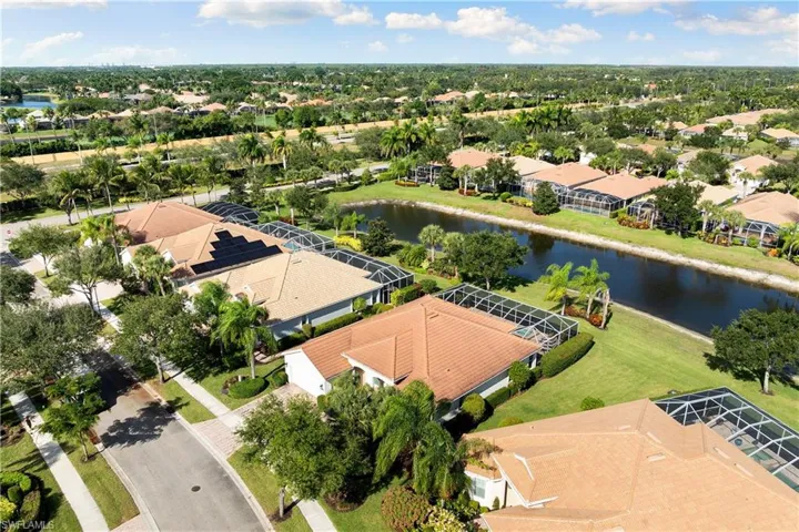 Aerial view of residential area with a nearby body of water
