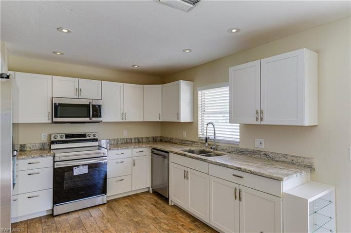 Granite countertops and updated cabinetry make this kitchen super functional.
