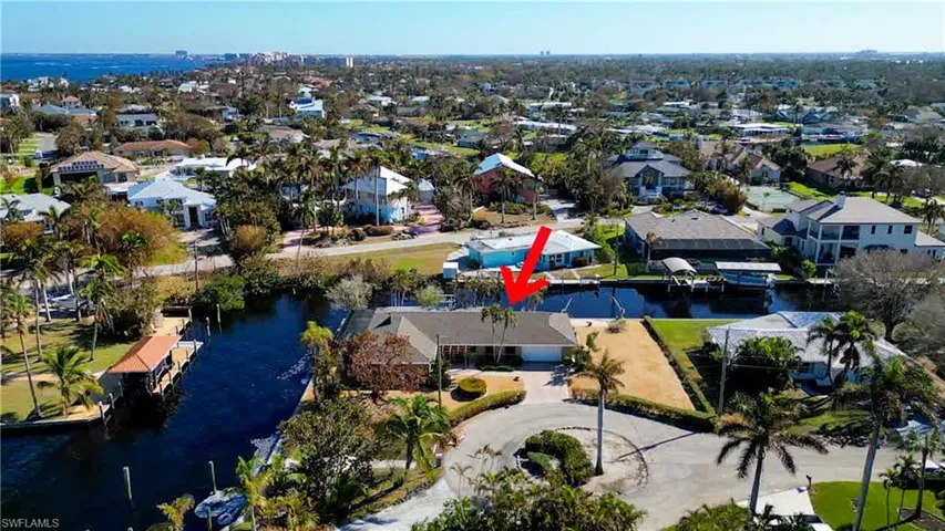 Located at the end of a quite Cul-de-sac in the sought after Iona McGregor corridor. Quick Direct Gulf Access! Canal Frontage on 2 sides and straight out to the Caloosahatchee Intracoastal Waterway! Just minutes to Sanibel, the back bay or the gulf of Mexico! Dock with a 10,000lb boat lift right behind your home! River views from your Kitchen window, Lanai, Pool Deck and Master Bedroom.