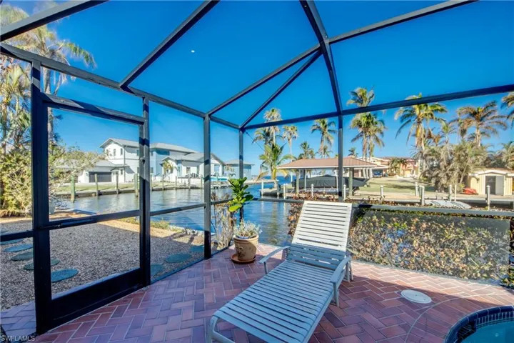 Pool Deck leading to side rear yard featuring great water views to River Views and Gorgeous Sunsets!