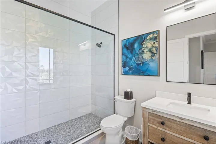 4th ensuite bathroom has floor to ceiling tile!
