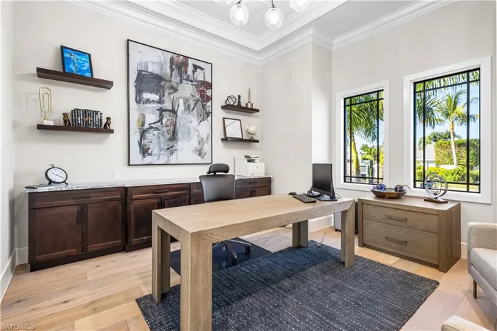 Tray ceiling, white oak flooring, Quartz countertop and cabinetry