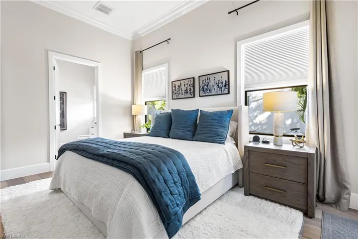 2nd bedroom with ensuite bath with access to your lanai/pool deck. Amazing natural light!