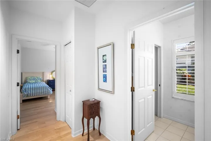 Corridor featuring light hardwood / wood-style flooring