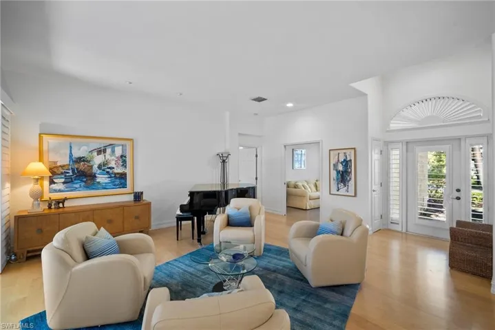 Living room with light wood-type flooring