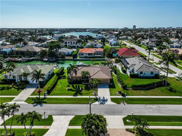 Aerial view with a residential view and a water view