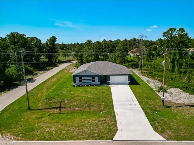 View of front of property with a front yard