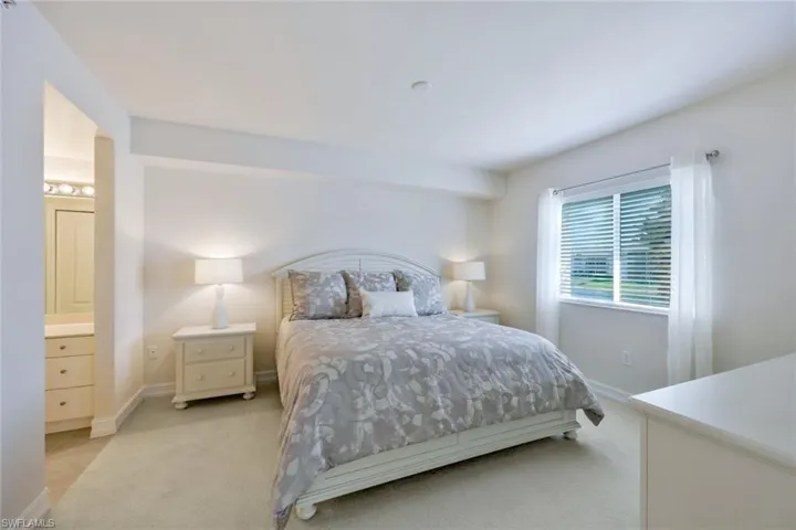 Bedroom featuring ensuite bath