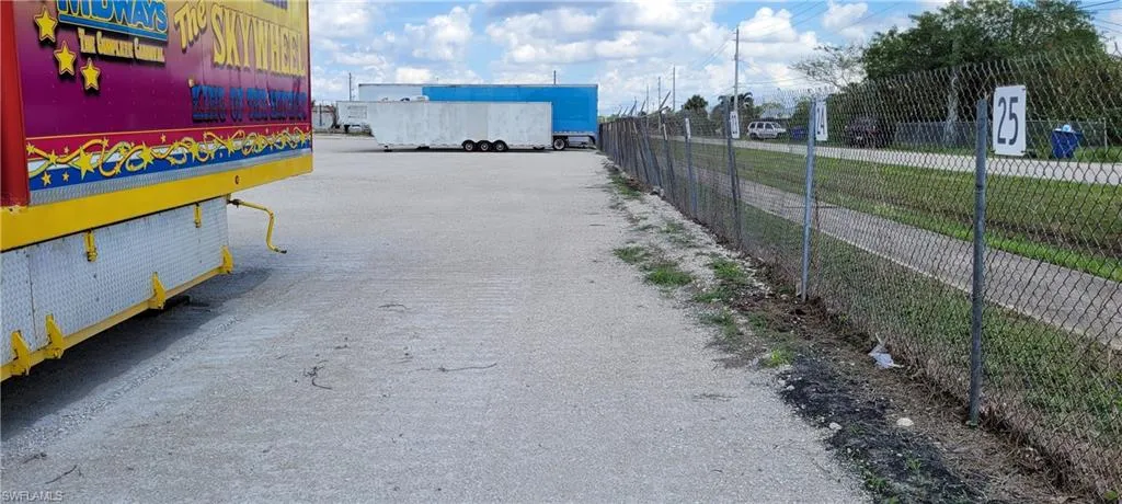 Up to two acres of secure parking area in Clewiston separated by fence and your own gate from the yard. DOT grade baserock and wide open turning area for large rigs and equipment. Just off of US Hwy 27.1855 Hookers Point RD, Clewiston, FL 33440