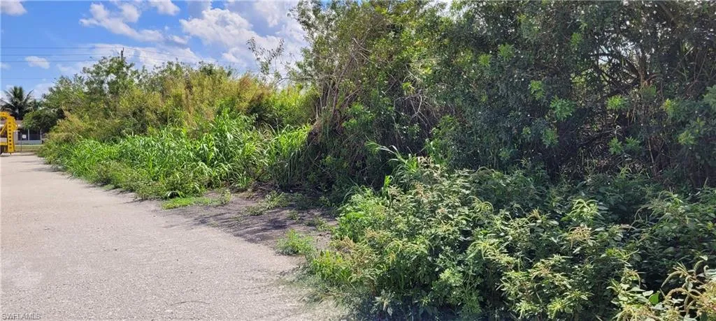 Up to two acres of secure parking area in Clewiston separated by fence and your own gate from the yard. DOT grade baserock and wide open turning area for large rigs and equipment. Just off of US Hwy 27.1855 Hookers Point RD, Clewiston, FL 33440