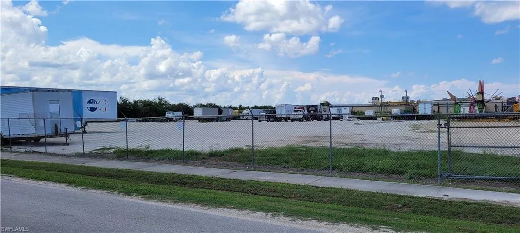 Up to two acres of secure parking area in Clewiston separated by fence and your own gate from the yard. DOT grade baserock and wide open turning area for large rigs and equipment. Just off of US Hwy 27.1855 Hookers Point RD, Clewiston, FL 33440