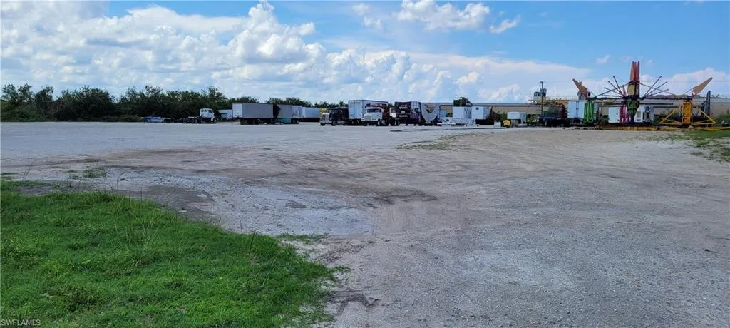 Up to two acres of secure parking area in Clewiston separated by fence and your own gate from the yard. DOT grade baserock and wide open turning area for large rigs and equipment. Just off of US Hwy 27.1855 Hookers Point RD, Clewiston, FL 33440