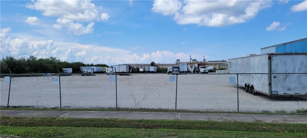 Up to two acres of secure parking area in Clewiston separated by fence and your own gate from the yard. DOT grade baserock and wide open turning area for large rigs and equipment. Just off of US Hwy 27.1855 Hookers Point RD, Clewiston, FL 33440
