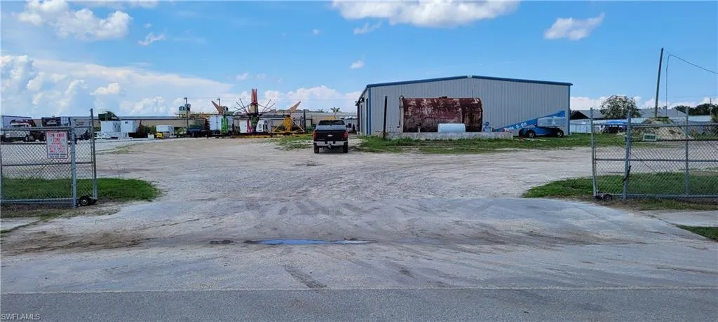Up to two acres of secure parking area in Clewiston separated by fence and your own gate from the yard. DOT grade baserock and wide open turning area for large rigs and equipment. Just off of US Hwy 27.1855 Hookers Point RD, Clewiston, FL 33440