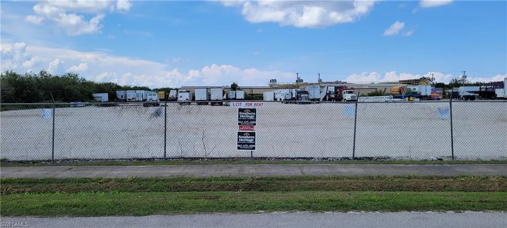 Up to two acres of secure parking area in Clewiston separated by fence and your own gate from the yard. DOT grade baserock and wide open turning area for large rigs and equipment. Just off of US Hwy 27.1855 Hookers Point RD, Clewiston, FL 33440