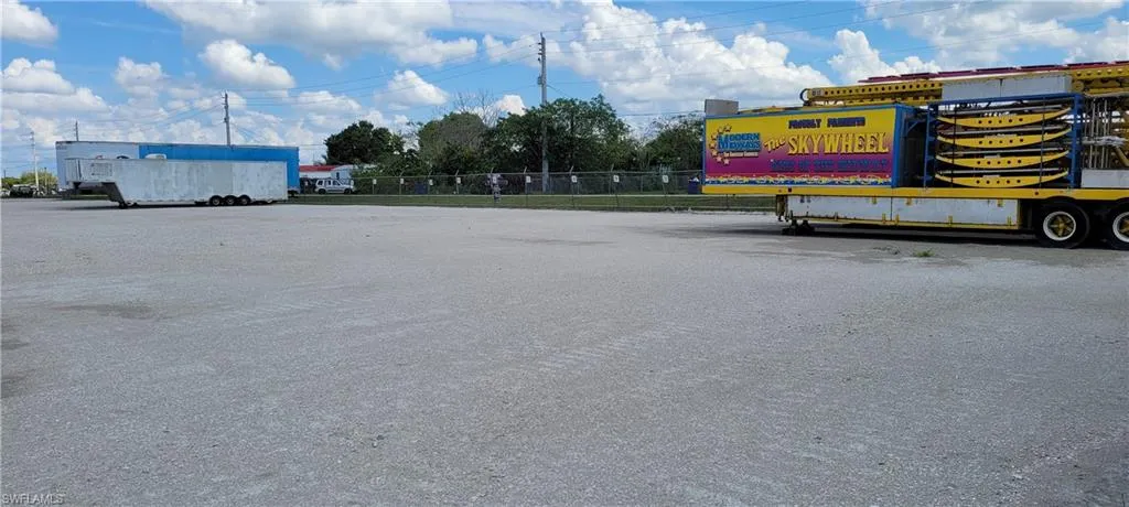 Up to two acres of secure parking area in Clewiston separated by fence and your own gate from the yard. DOT grade baserock and wide open turning area for large rigs and equipment. Just off of US Hwy 27.1855 Hookers Point RD, Clewiston, FL 33440
