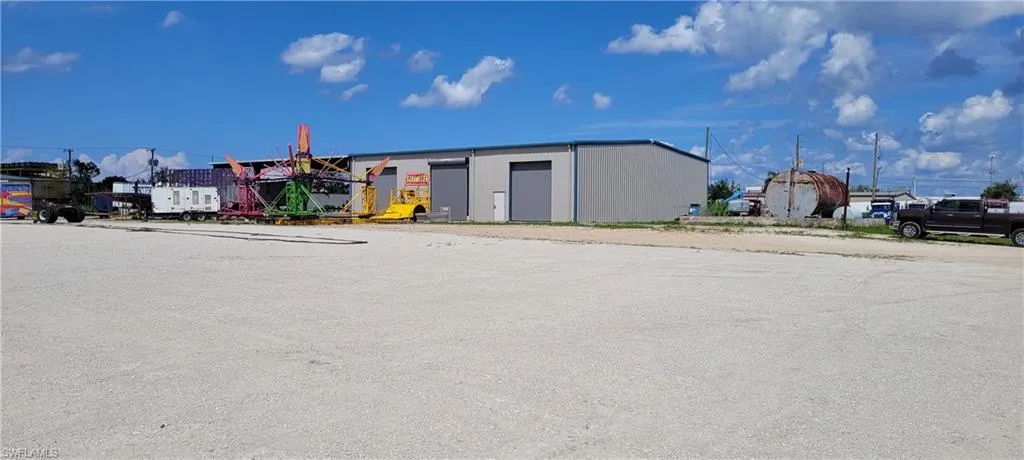 Up to two acres of secure parking area in Clewiston separated by fence and your own gate from the yard. DOT grade baserock and wide open turning area for large rigs and equipment. Just off of US Hwy 27.1855 Hookers Point RD, Clewiston, FL 33440