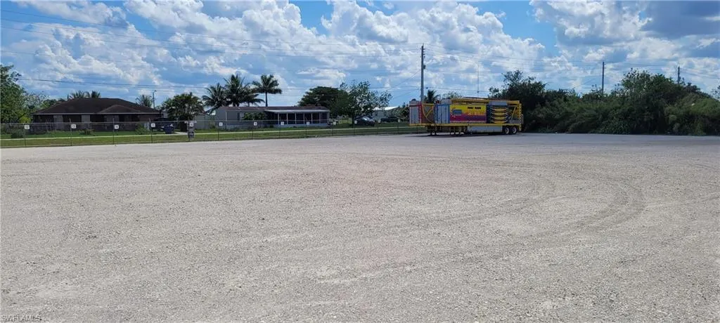 Up to two acres of secure parking area in Clewiston separated by fence and your own gate from the yard. DOT grade baserock and wide open turning area for large rigs and equipment. Just off of US Hwy 27.1855 Hookers Point RD, Clewiston, FL 33440