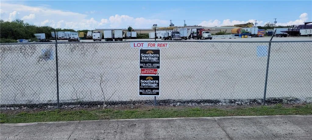 Up to two acres of secure parking area in Clewiston separated by fence and your own gate from the yard. DOT grade baserock and wide open turning area for large rigs and equipment. Just off of US Hwy 27.1855 Hookers Point RD, Clewiston, FL 33440
