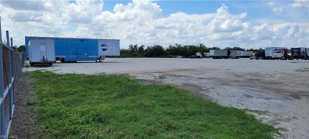 Up to two acres of secure parking area in Clewiston separated by fence and your own gate from the yard. DOT grade baserock and wide open turning area for large rigs and equipment. Just off of US Hwy 27.1855 Hookers Point RD, Clewiston, FL 33440