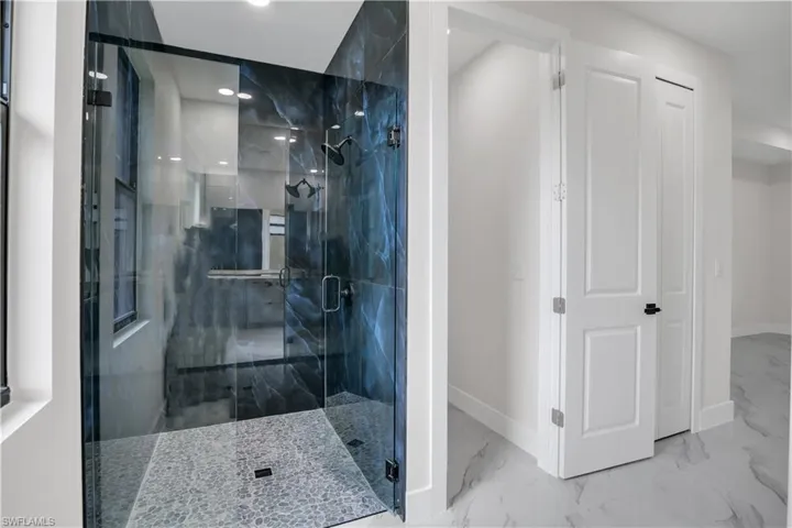 Bathroom featuring an enclosed shower