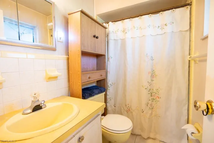 With walk-in shower.