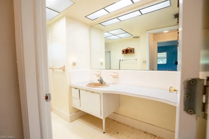 Guest bathroom, spacious with shower and bath.