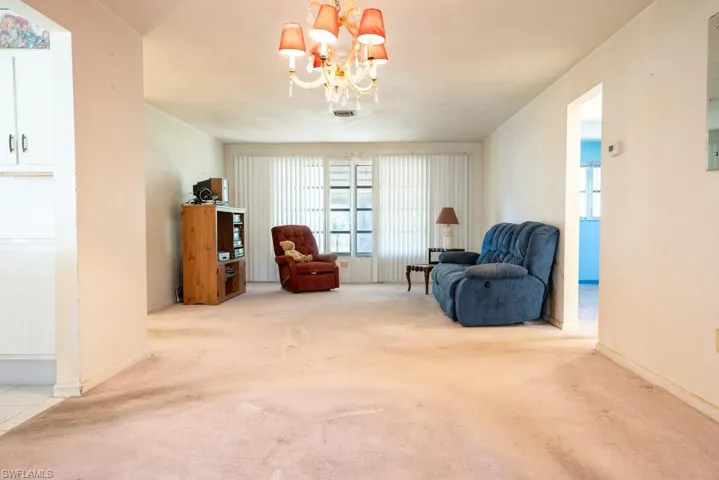 Large enough to accommodate large dining room table and additional side bar.