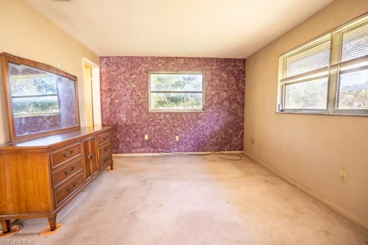 With view to the back yard.  En-suite master bath and walk-in closet.