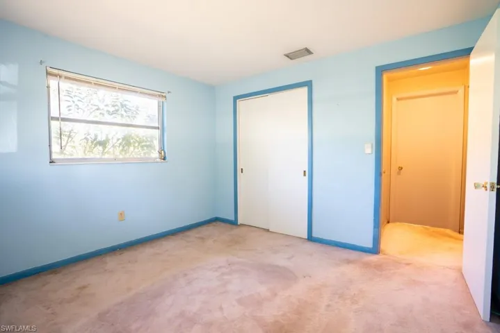 Guest bedroom with large closet.