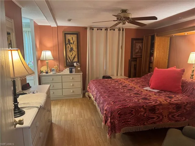 Wood-finish flooring throughout the room