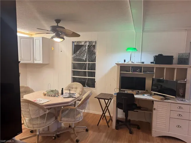 Wood-finish flooring throughout the space