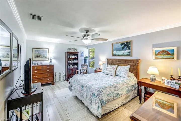 Primary bedroom is more than spacious to fit all of your furniture