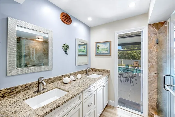 Primary Bathroom with can serve as a pool bathroom with lanai access