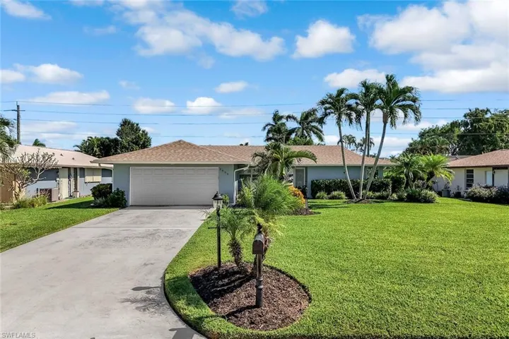 This home with newer roof offers an long driveway for your company