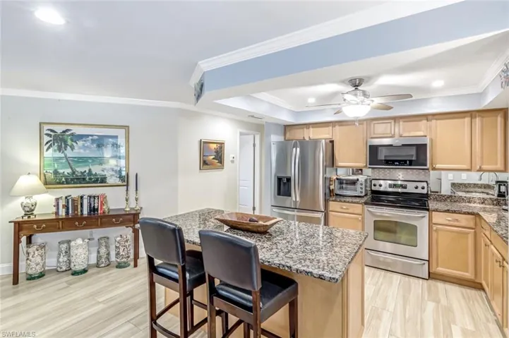 Open concept allows you to be in the Kitchen and entertain your guests